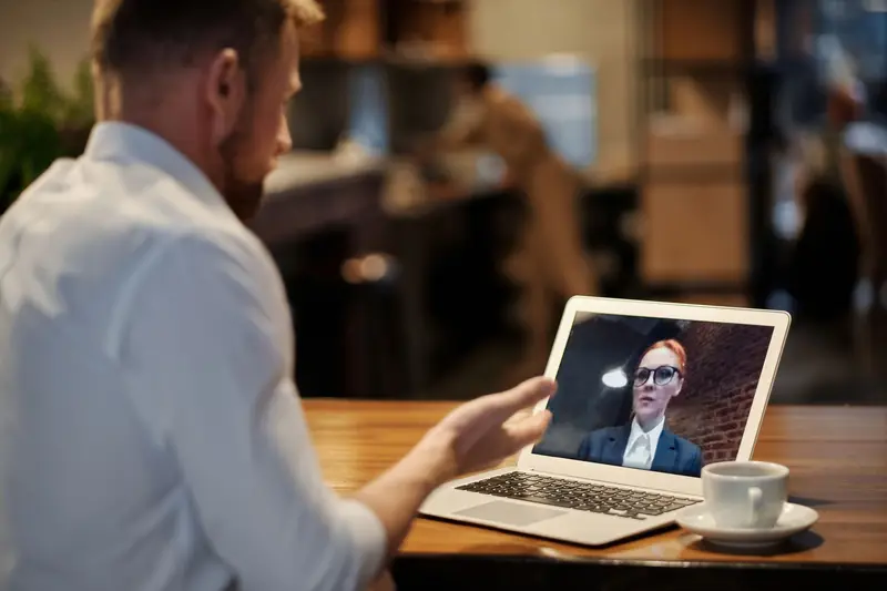 Development team — engineers collaborating on build deliverables via video conference — staff roles and invoice line items