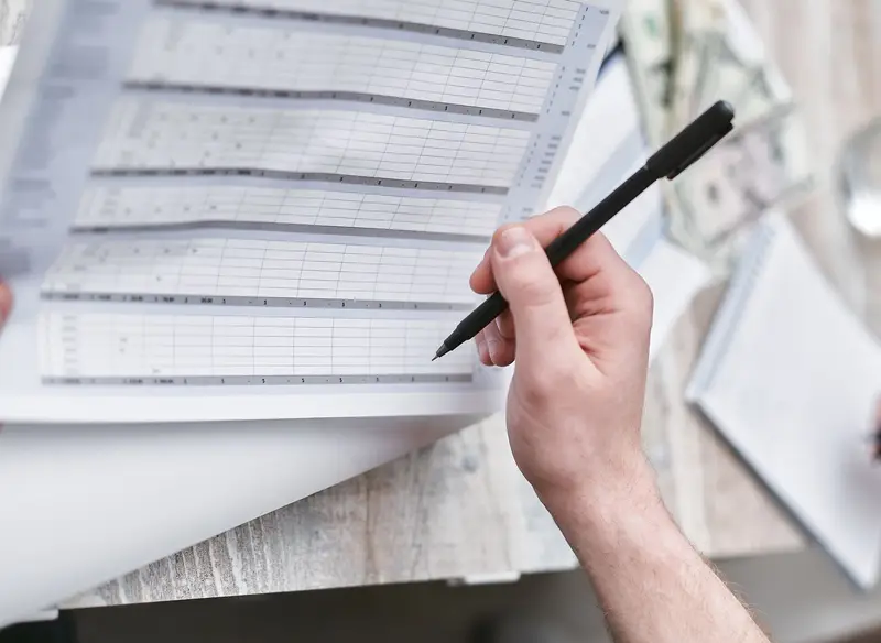 Data readiness preparation — analyst reviewing conversion metrics and historical sales records in structured format — minimum dataset requirements for predictive models